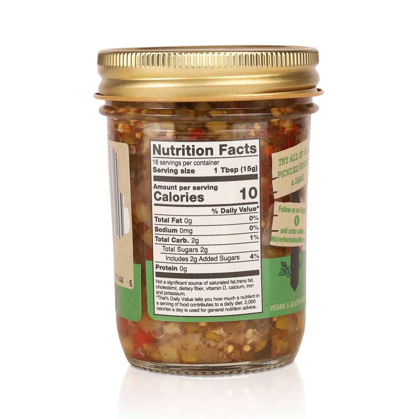 A glass jar of chili oil with a gold metal lid and a white nutrition facts label, shown on a clean white background.