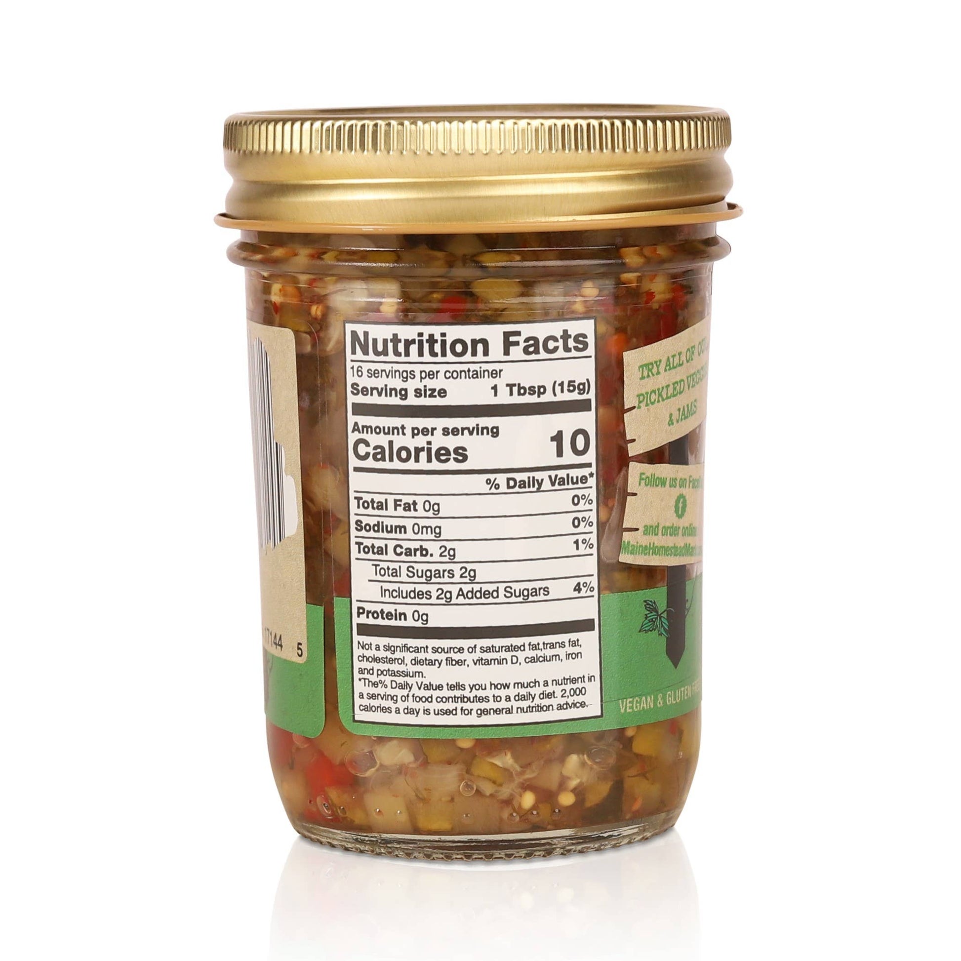 A glass jar of chili oil with a gold metal lid and a white nutrition facts label, shown on a clean white background.