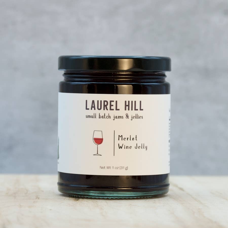 Jar of Laurel Hill Merlot Wine Jelly on a neutral background