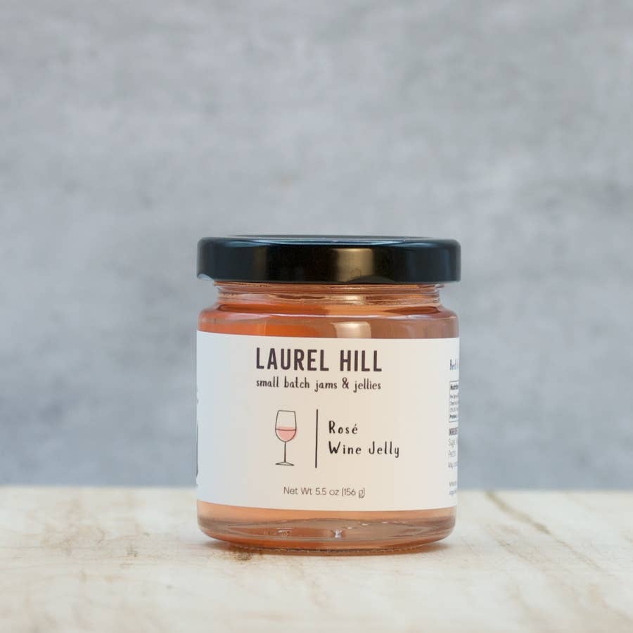 Jar of Laurel Hill Rose Wine Jelly on a neutral background