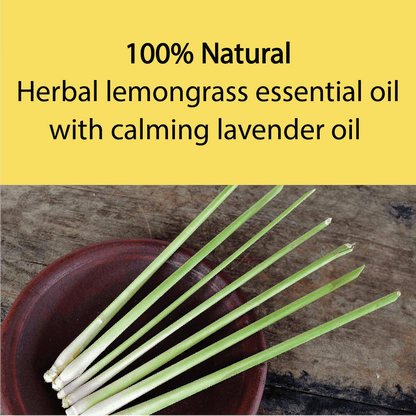 Text banner reading '100% Natural Herbal lemongrass essential oil with calming lavender oil' above a photo of fresh lemongrass stems arranged in a dark brown bowl on a rustic wooden surface.