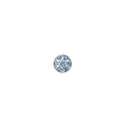 Round blue gemstone earring on a white background