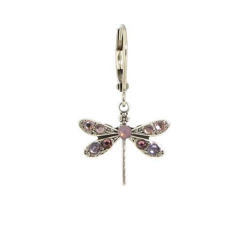 Dragonfly-shaped earring with pink gemstones on a white background