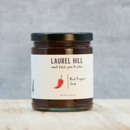 Jar of Laurel Hill Red Pepper Jam on a neutral background