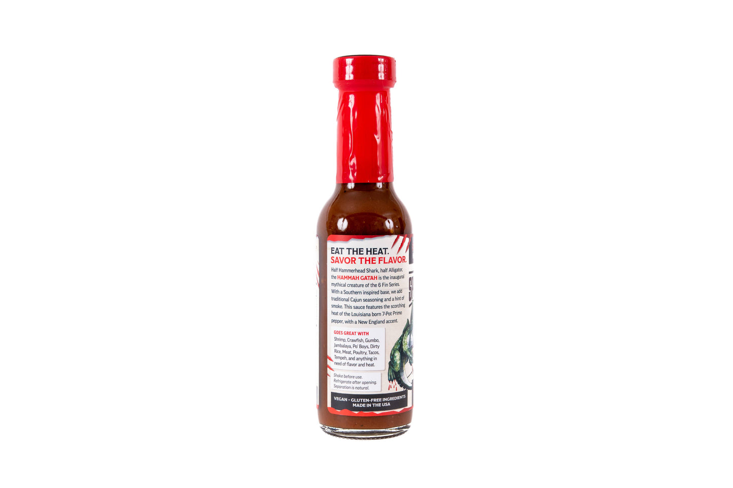A bottle of hot sauce with a red cap and a white label that reads 'SAY THE HEAT, SAVOR THE FLAVORS' on a plain white background.