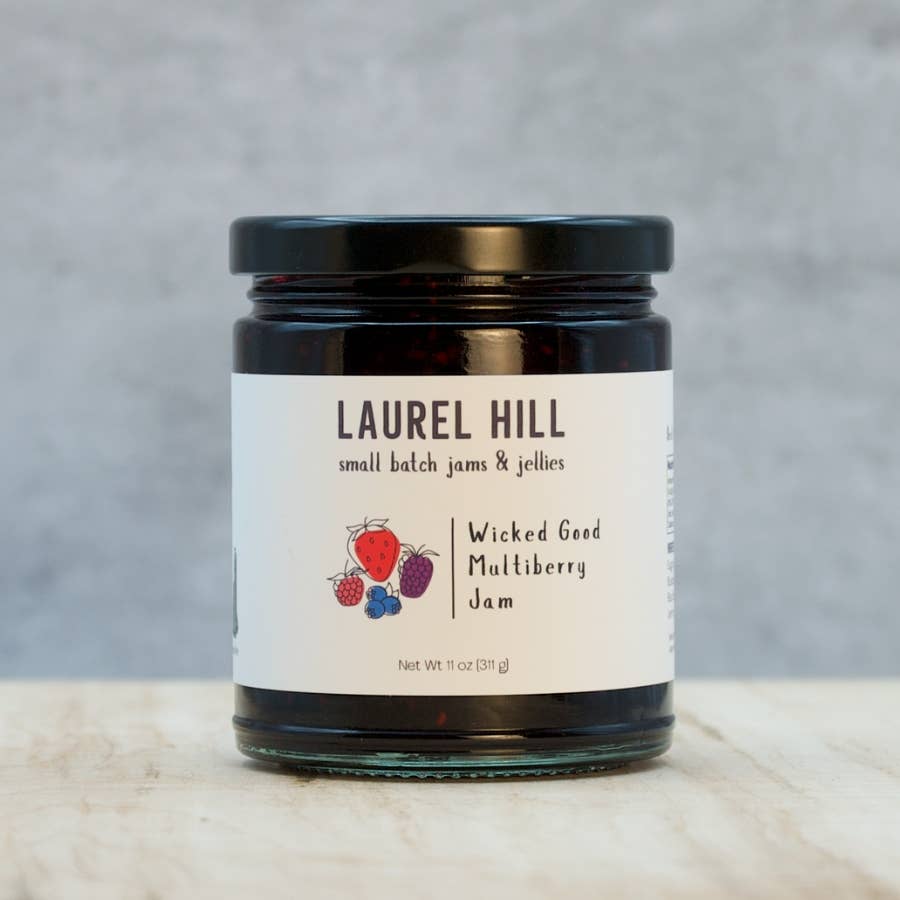Jar of Laurel Hill Wicked Good Multiberry Jam on a neutral background