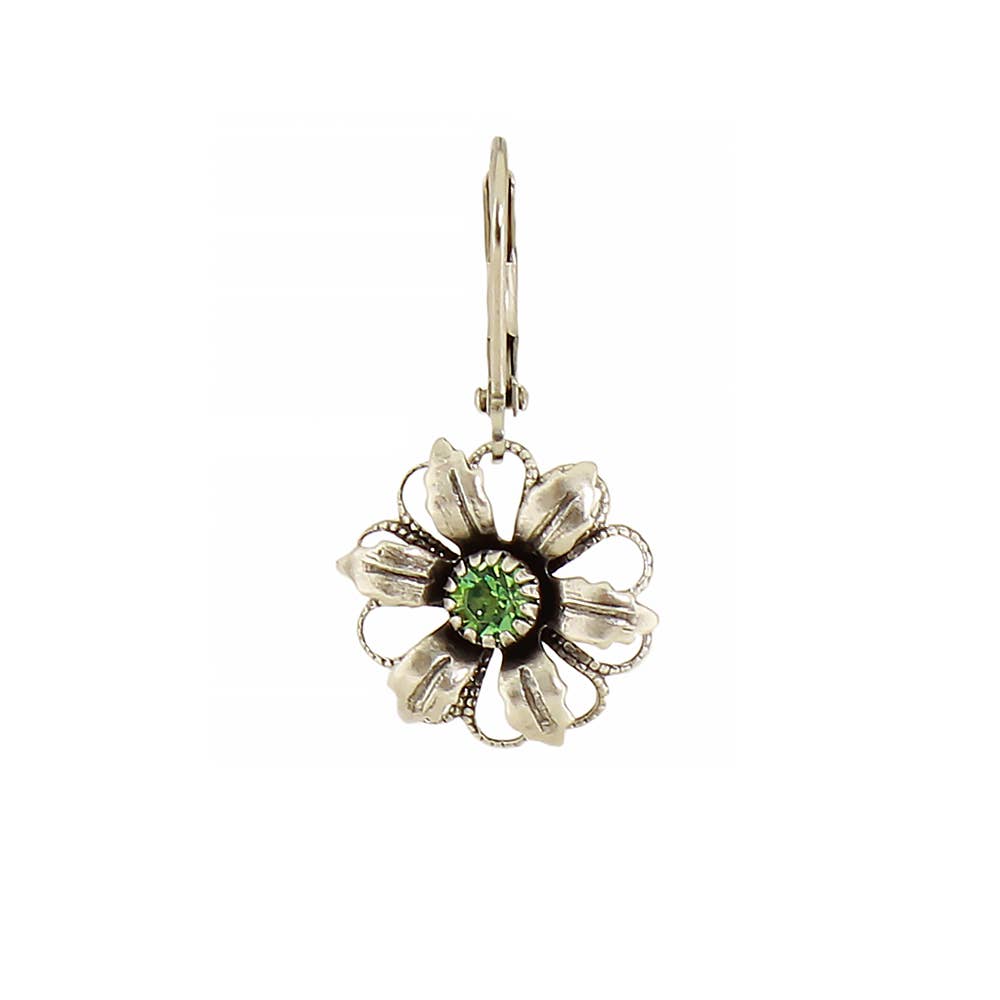 Floral earring with a green gemstone on a white background