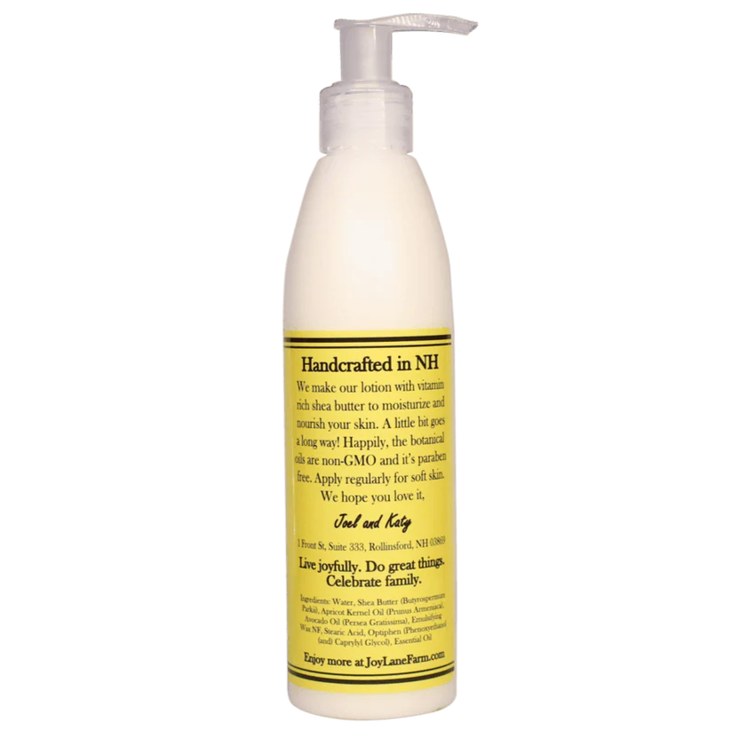 Lotion bottle with pump and yellow label on a white background