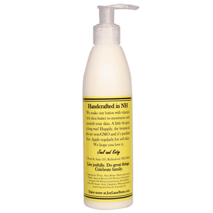 Lotion bottle with pump and yellow label on a white background