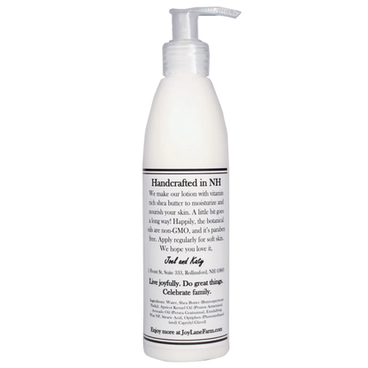 White lotion bottle with pump on a white background
