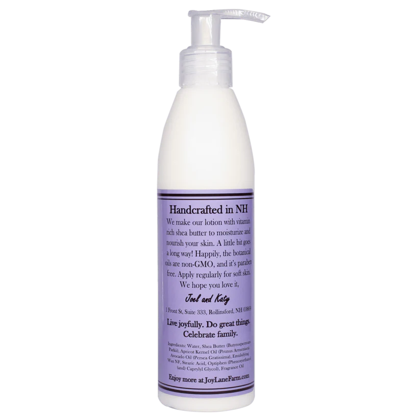 Handcrafted lotion bottle with pump on a white background