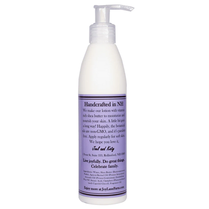 Handcrafted lotion bottle with pump on a white background