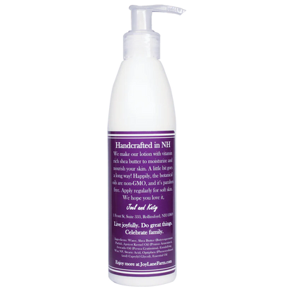 White lotion bottle with a purple label on a white background