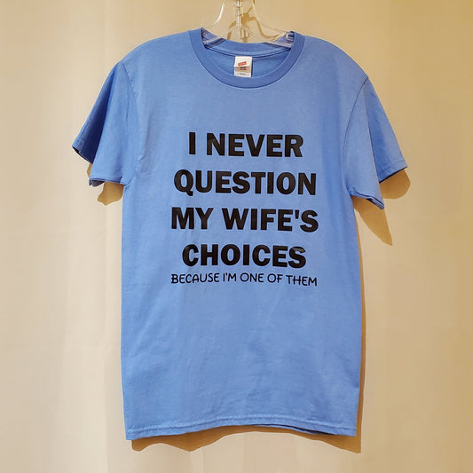 Blue t-shirt with humorous text on a beige background
