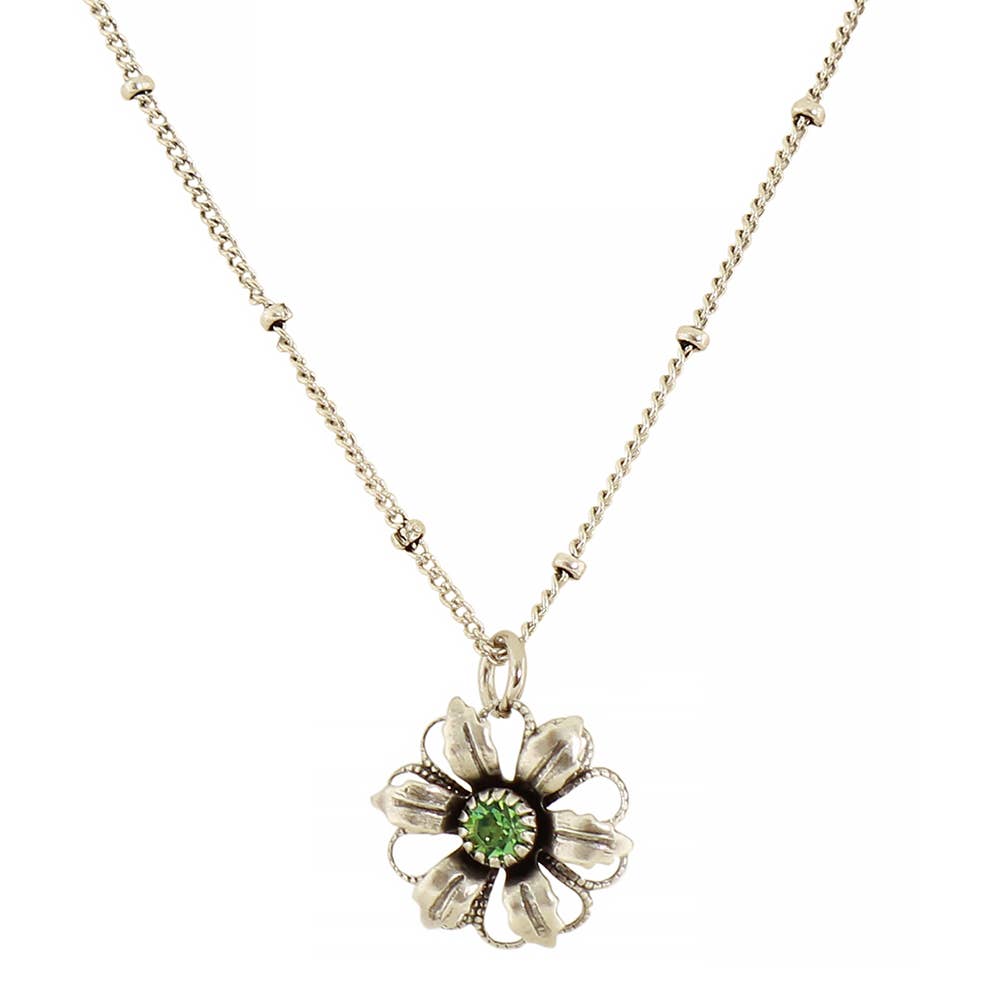 A silver-tone flower pendant necklace with a central green gemstone, displayed on a clean white background.