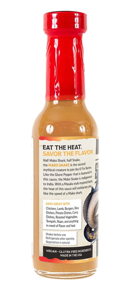 Hot sauce bottle with red cap and label on a white background