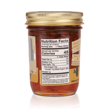 Jar of honey with a nutrition facts label on a white background