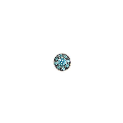 A single round stud earring featuring a central light blue gemstone surrounded by a halo of smaller dark blue and silver-toned stones, set against a plain white background.