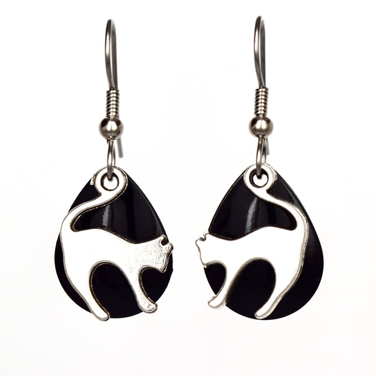 Cat-shaped earrings with black and silver design on a white background