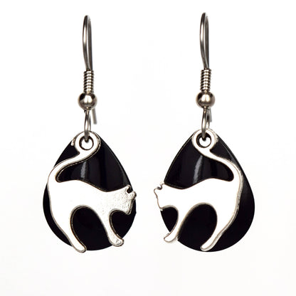 Cat-shaped earrings with black and silver design on a white background