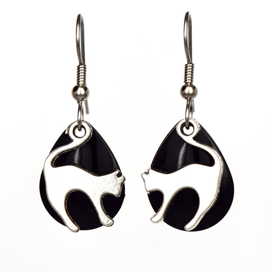 Cat-shaped earrings with black and silver design on a white background