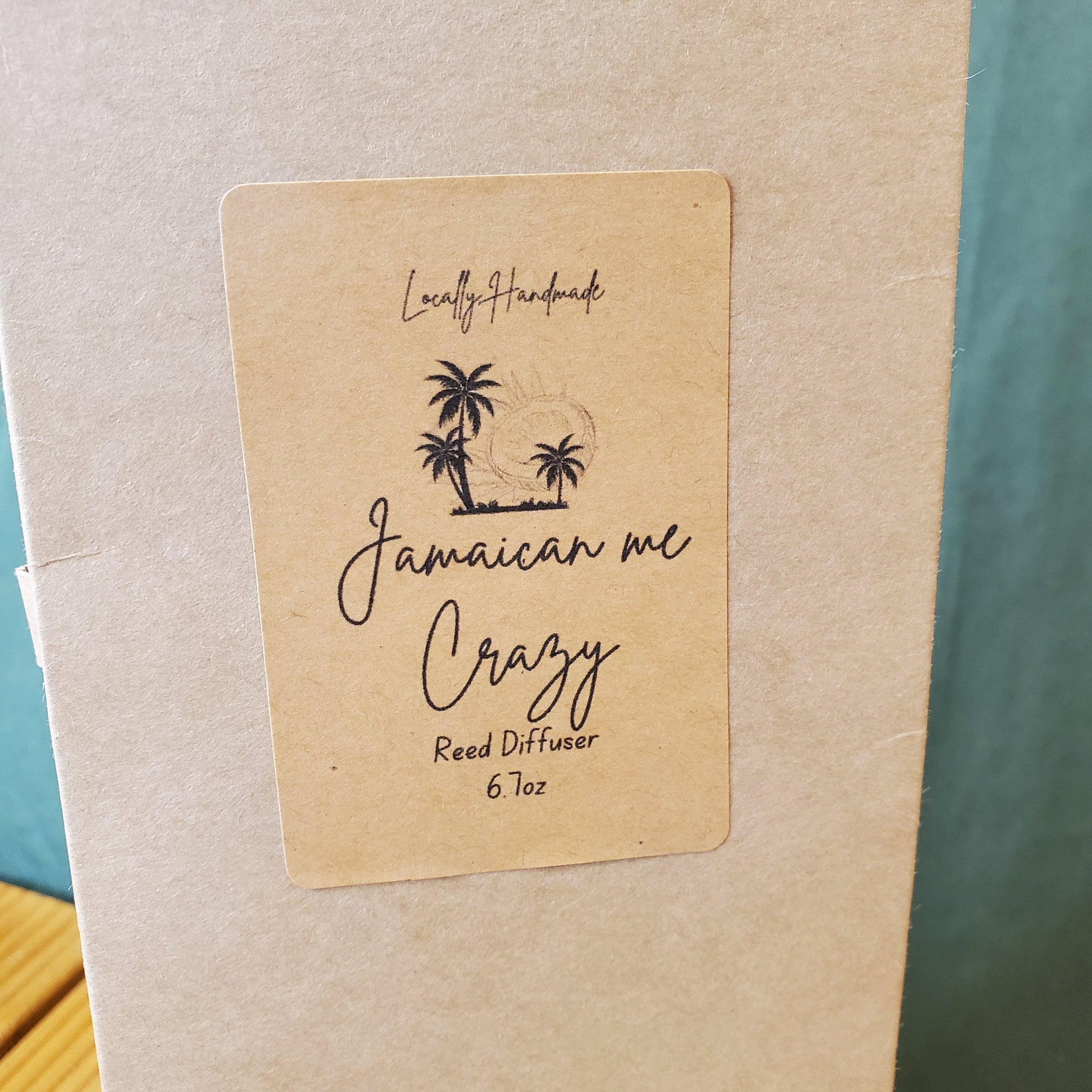Jamaican me Crazy reed diffuser label on a cardboard backing