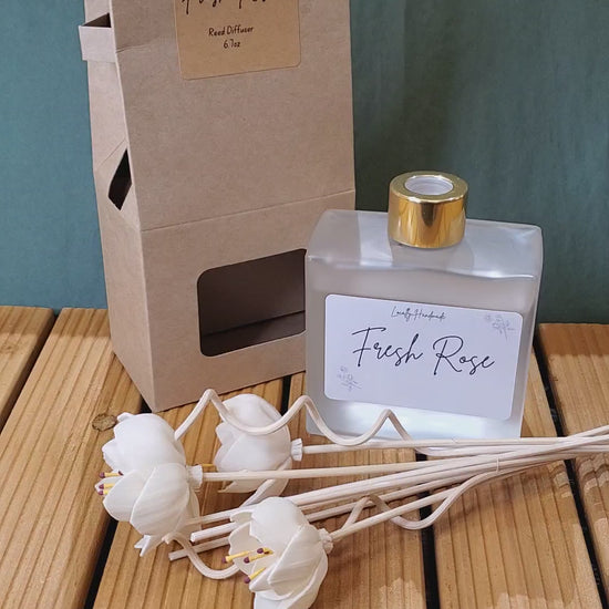 Reed diffuser on wood table